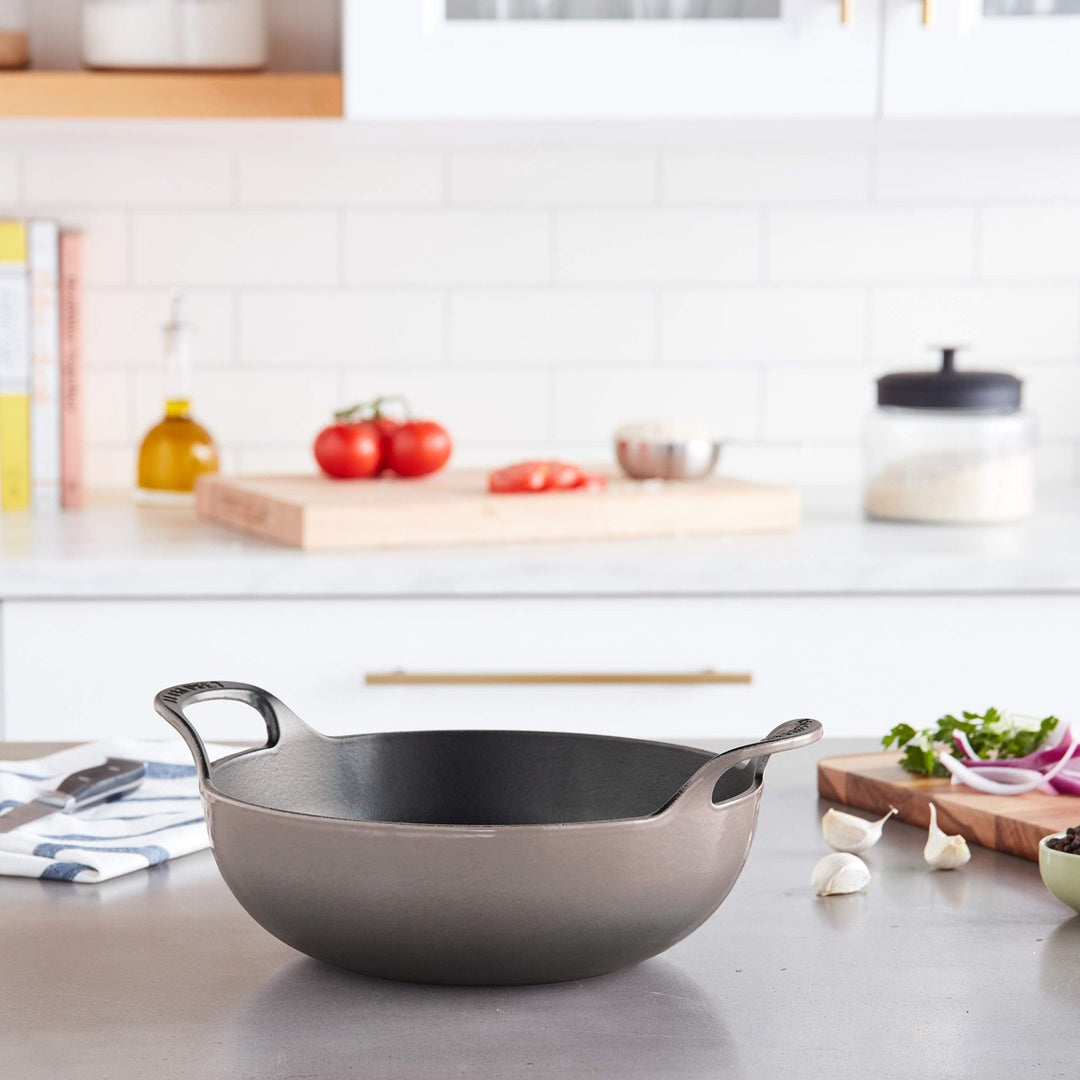 https://www.kitchensmart.ca/cdn/shop/products/le-creuset-le-creuset-cast-iron-balti-dish-20142024444001-700346.jpg?v=1689824273&width=1080